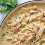 Delicious creamy chicken garlic parmesan pasta served in a bowl.