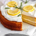 Rosemary's Bakery Whipped Cream Cake topped with mascarpone whipped cream and fresh fruit.
