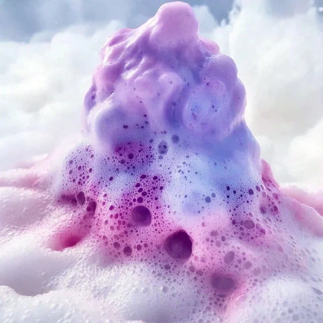 A colorful volcano eruption experiment demonstrating safe volcanic activity.