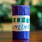 Colorful homemade shakers crafted from pasta for kids' crafts.