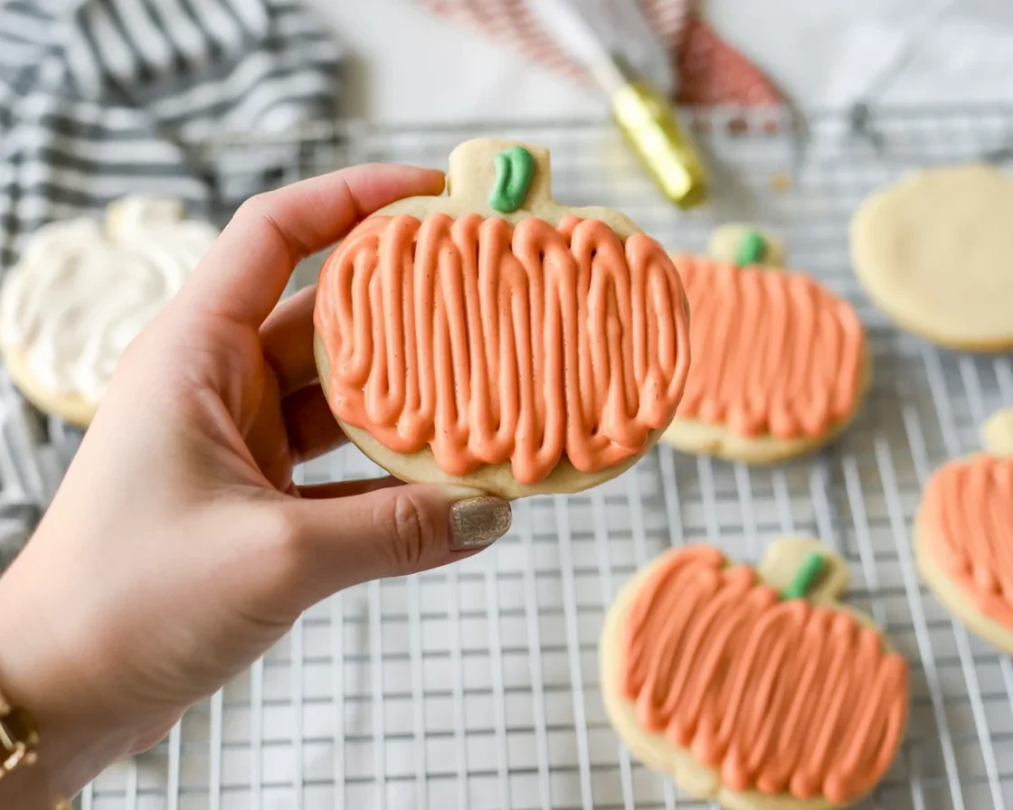 Decorated Halloween sugar cookies placed on a table for festive celebrations.