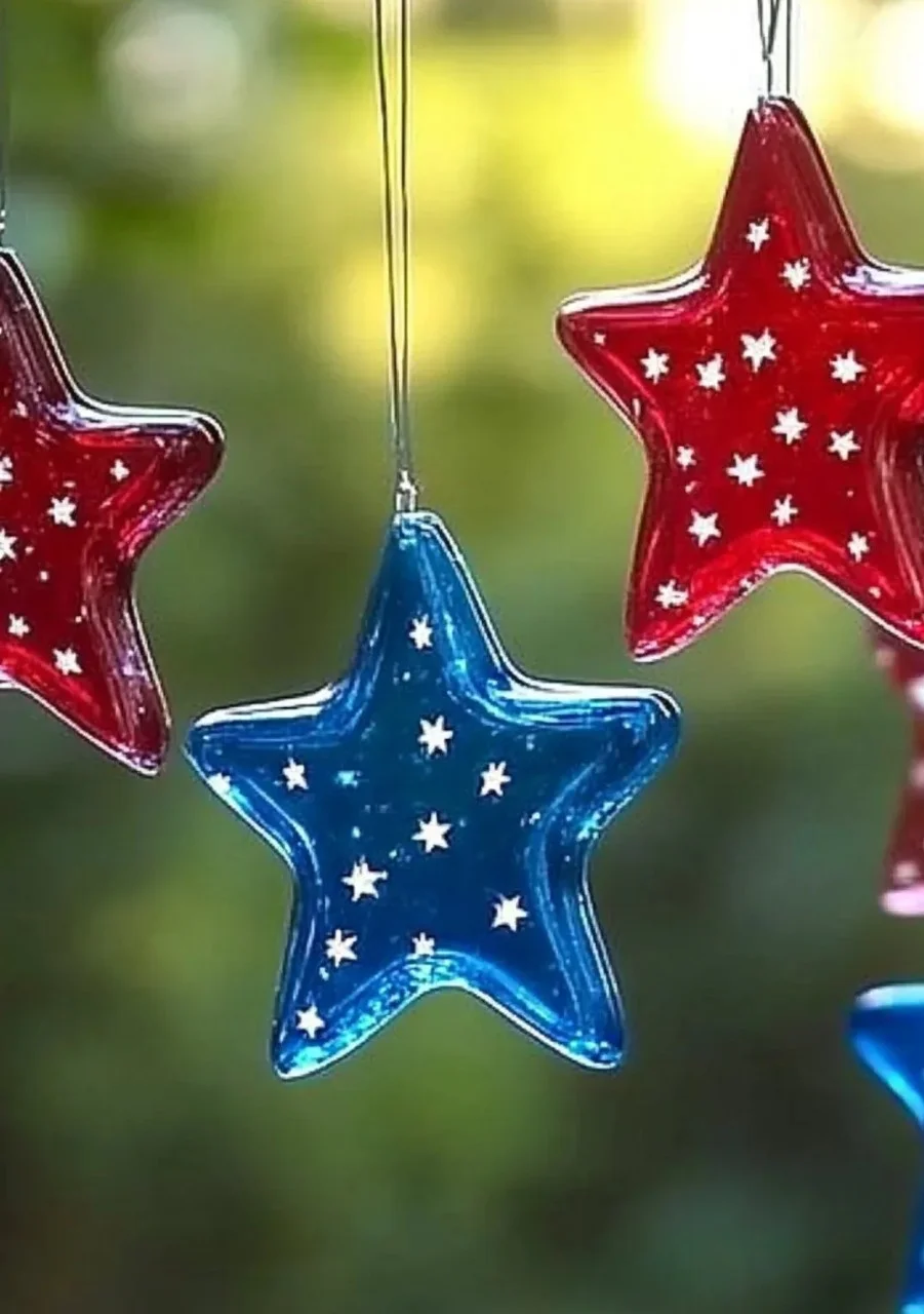 Colorful crayon star sun catchers hanging in a sunny window