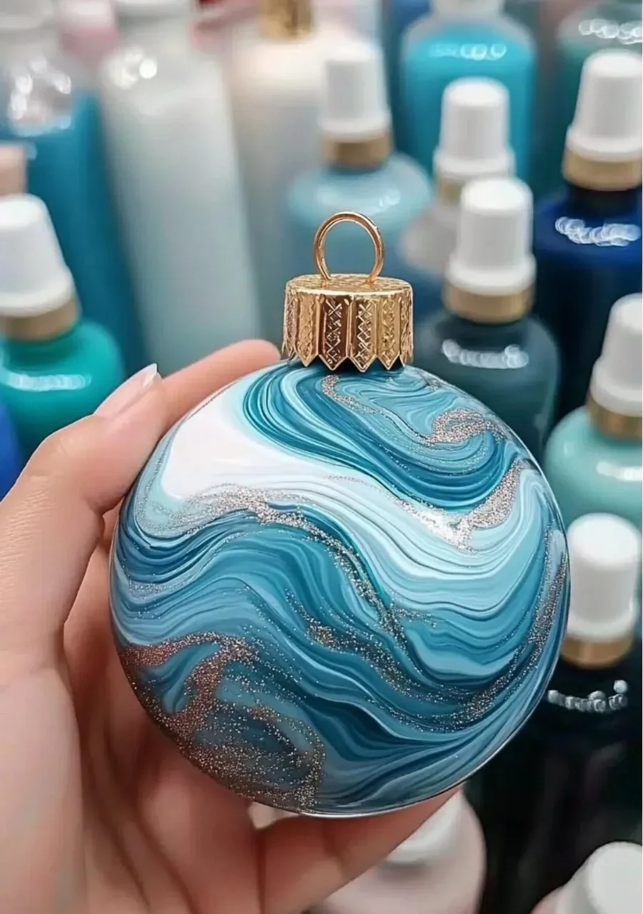 Colorful paint swirl ornaments handcrafted for holiday decorations.