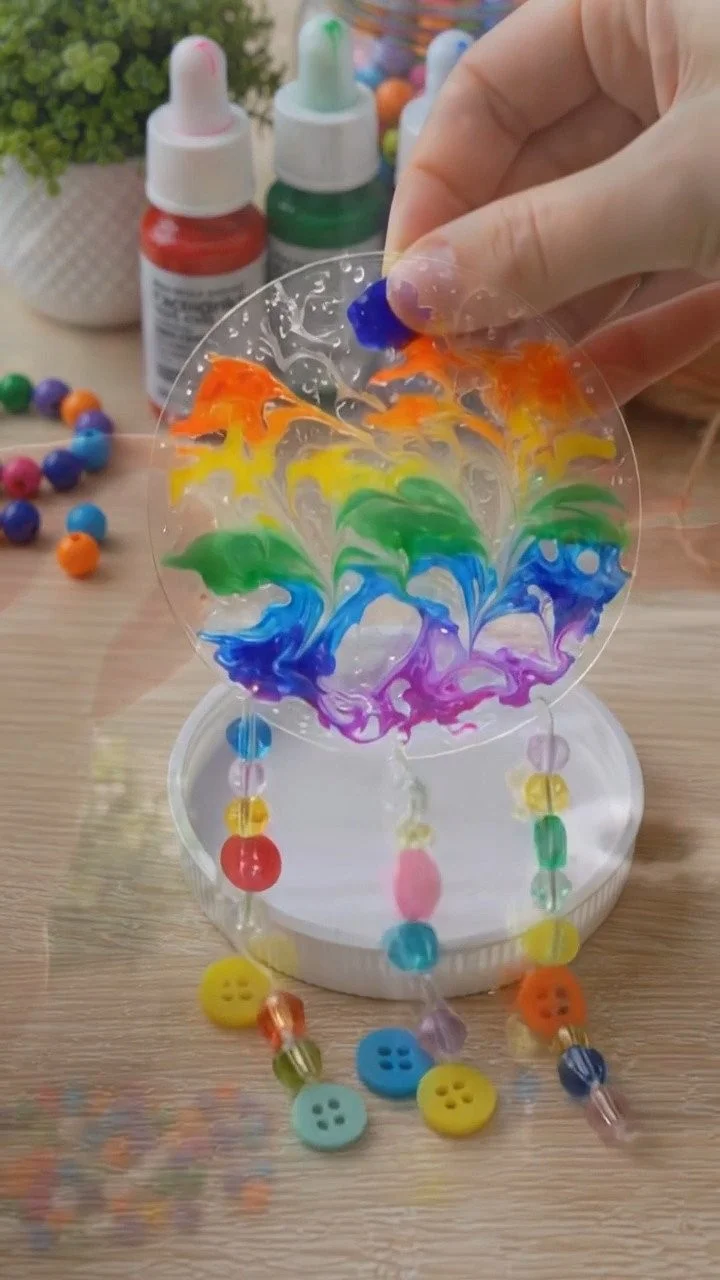 DIY swirled glue window suncatcher creates mesmerizing colorful patterns that glow beautifully in sunlight ✨ A magical decorative DIY. Save this project! #SuncatcherDIY #GlueCraft #KidsArt #CreativeK... 12 DIY swirled glue window suncatcher creates mesmerizing colorful patterns that glow beautifully in sunlight ✨ A magical decorative DIY. Save this project! #SuncatcherDIY #GlueCraft #KidsArt #CreativeK...
