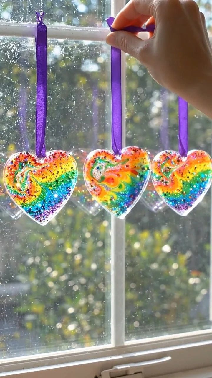 Magical swirled glue suncatchers glow with colorful swirling designs that brighten any window ✨ A mesmerizing decorative DIY. 10 Magical swirled glue suncatchers glow with colorful swirling designs that brighten any window ✨ A mesmerizing decorative DIY.